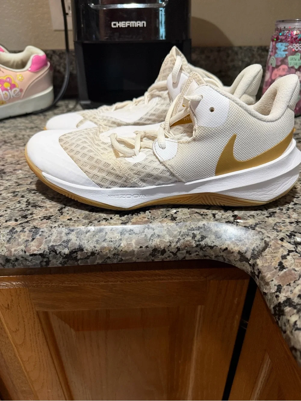 Nike Kids White Sneakers with Metallic Gold Accents